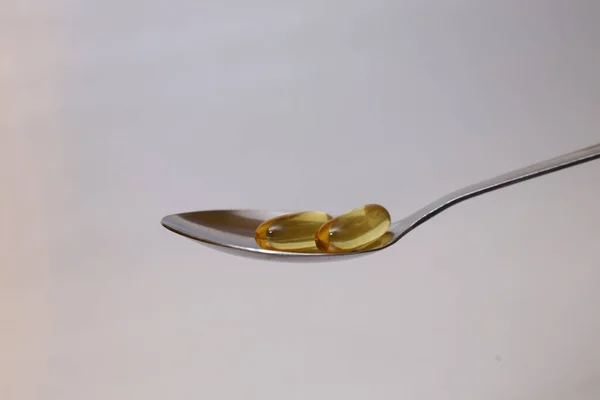 Spoon Omega Capsules White Background — Stock Photo, Image