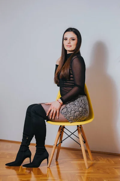Beautiful Young Woman Sitting Chair Studio — Stockfoto