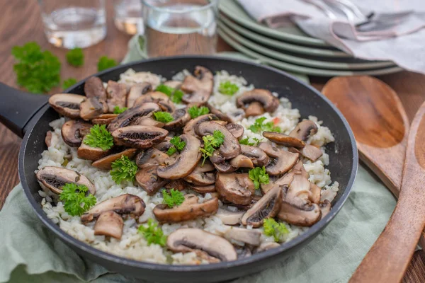 stock image fried mushrooms with onions and parsley