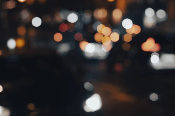 Geceleyin Bokeh Işıklarının Bulanık Arkaplanı — Stok fotoğraf