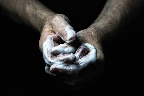 Close Uma Mão Homem Segurando Uma Placa Preta — Fotografia de Stock
