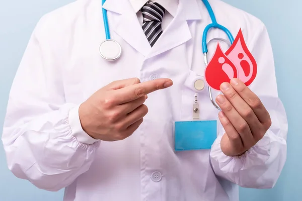 Doctor Holding Stethoscope Red Heart White Background — Stock Photo, Image