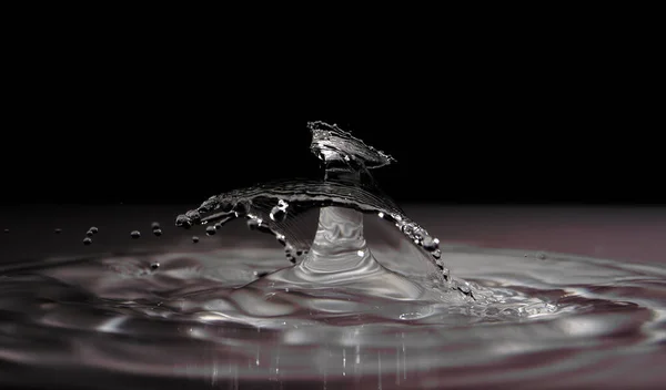 Salpicadura Agua Sobre Fondo Negro —  Fotos de Stock