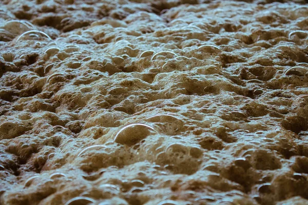 Meriveden Pinta Vaahtoa Kiviä — kuvapankkivalokuva