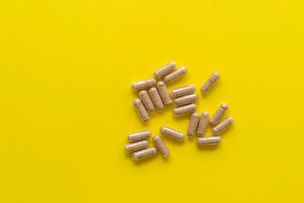 Yellow Pills Yellow Background Top View — Stock Photo, Image