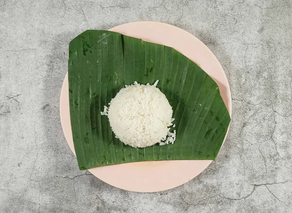 Rýže Zeleným Listem Šedém Pozadí — Stock fotografie