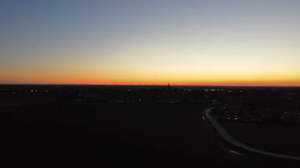 Ηλιοβασίλεμα Πάνω Από Την Πόλη Της Πρωτεύουσας Των Κάτω Χωρών — Φωτογραφία Αρχείου