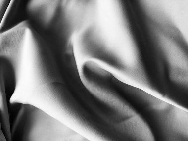 Yumuşak dalgalı ipek kumaş tasarım arka planı. Tekstil endüstrisi pazarlama ve reklamcılığı için arkaplan tasarımı