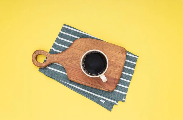 Filter coffee on wood standing and coffee beans. Isolated background