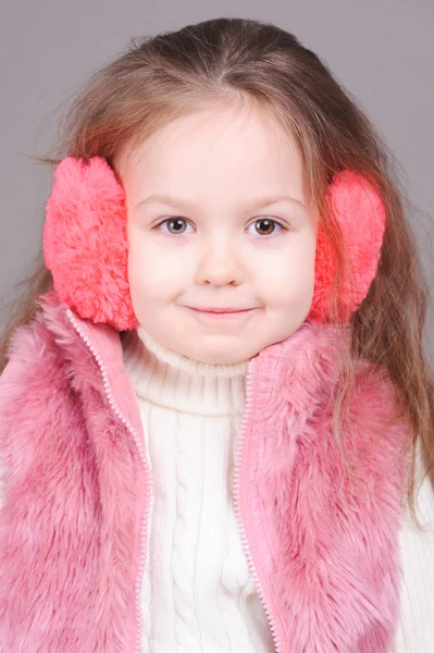 Κοπέλα φορώντας ακουστικά γούνα — Φωτογραφία Αρχείου