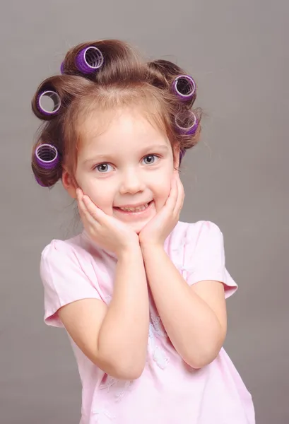 Girl wearing curlers — Stock Photo, Image