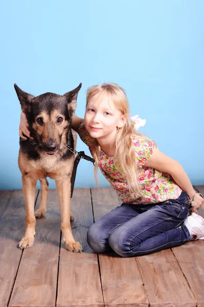 Little girl with shepherd — Stock Photo, Image