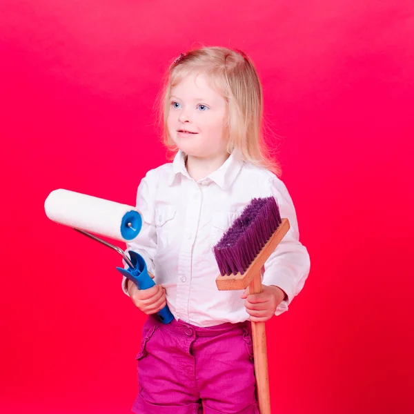 Girl holding repair tools — Stock Photo, Image