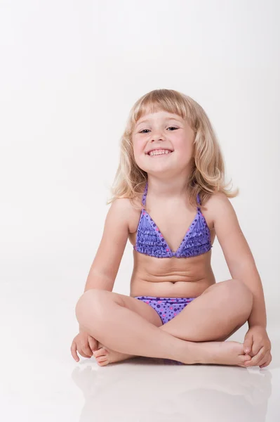 Little girl in swimsuit — Stock Photo, Image