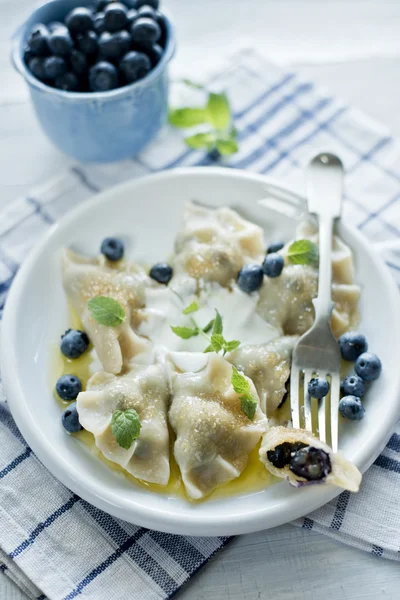 Dumplings with blueberries — Stock Photo, Image