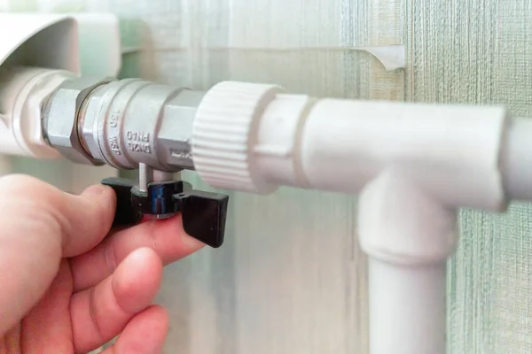 Man Opens Valve Metal Radiator Central Heating Room — Stock Photo, Image