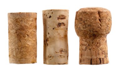 Beyaz arka planda izole edilmiş şarap mantarları. Üst üste üç farklı mantar tipini kapat