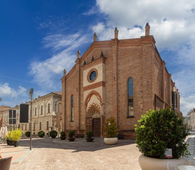 Alba, Langhe, Piedmont, Italy - August 16, 2022: view of Church of San Domenico in gothic style in the historic center