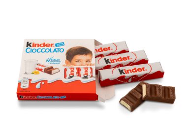 Alba, Italy - August 19, 2022: Kinder Ferrero Chocolate bar with milk heart, italian packaging of 4 pieces with wrapped bars and one cut, isolated on white, clipping path