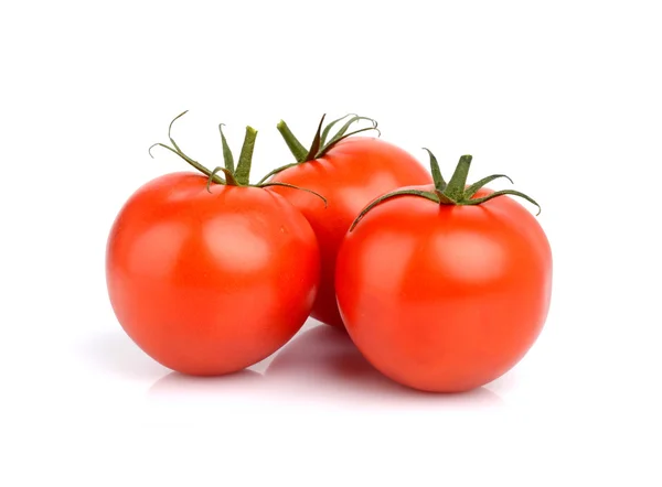 Three red tomatoes isolated on white — Stock Photo, Image