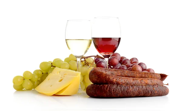Wine and grapes isolated on white with cheese and sausage — Stock Photo, Image