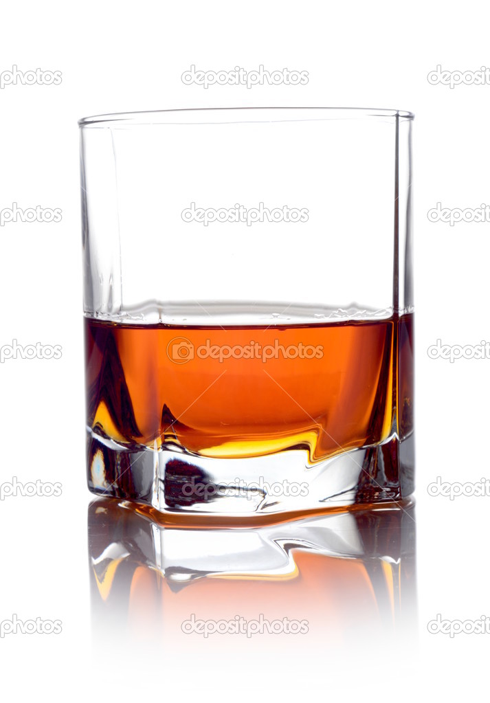 Whisky in a glass isolated on white