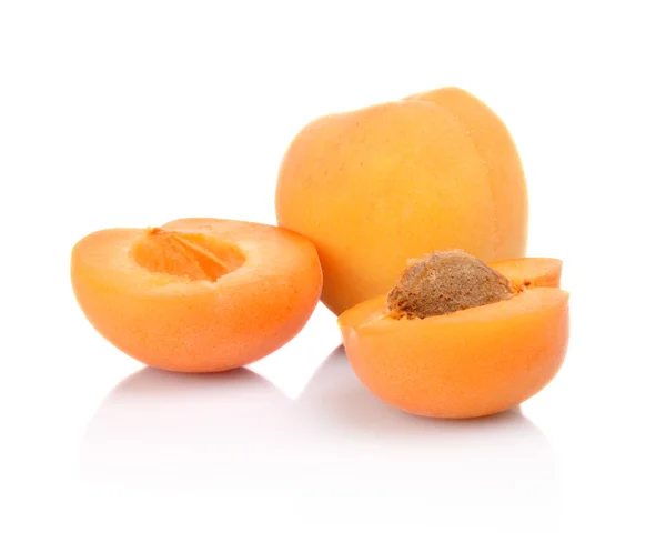 Three sliced apricots isolated on white — Stock Photo, Image