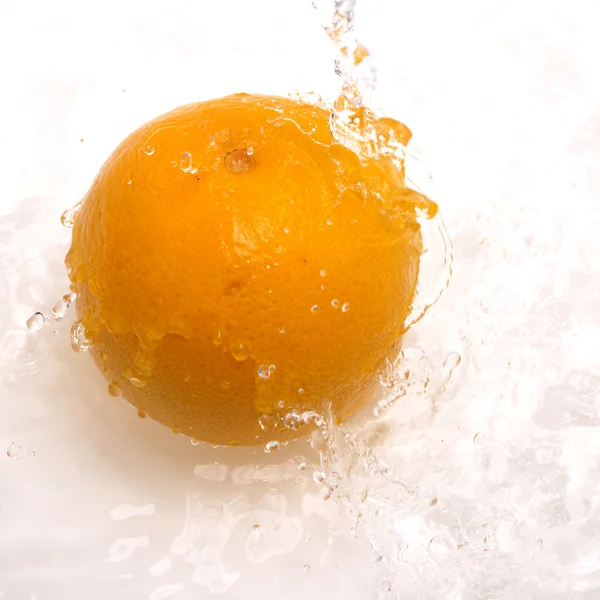 Orange with water splash — Stock Photo, Image