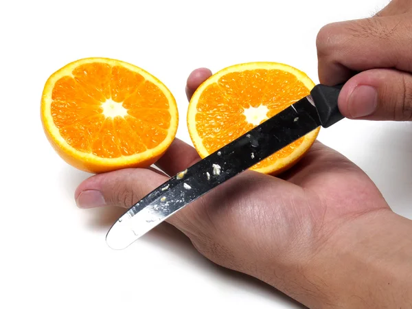 Half orange in the hand — Stock Photo, Image
