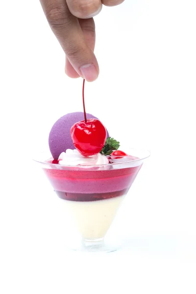 Strawberry shot cake with cherry and macaron — Stock Photo, Image