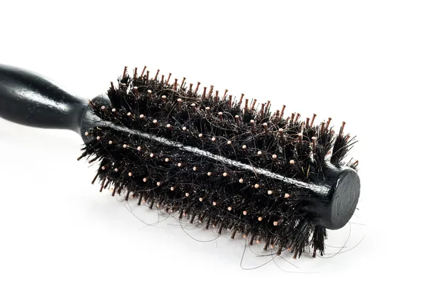 Escova de cabelo redonda em fundo branco — Fotografia de Stock