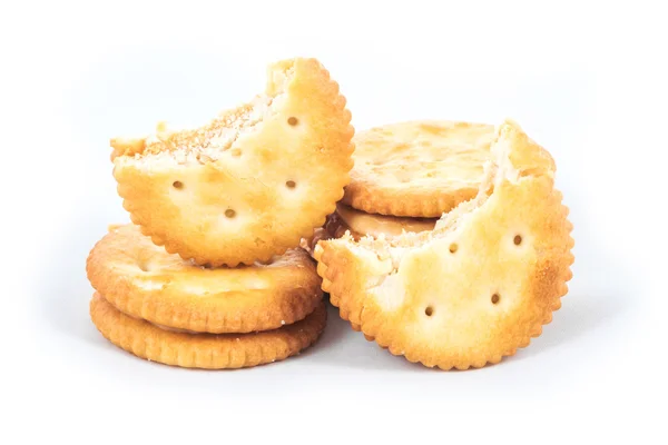 Крем с арахисовым маслом и печенье на белом фоне — стоковое фото
