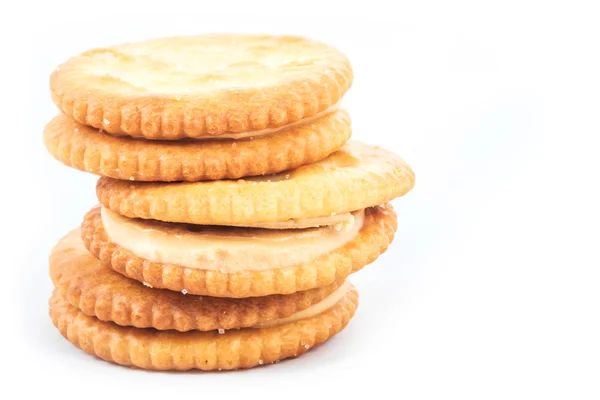 Peanut butter cream and biscuit in white background — Stock Photo, Image