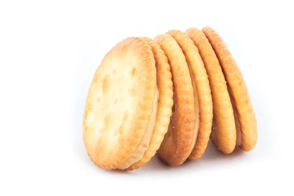 Creme de manteiga de amendoim e biscoito em fundo branco — Fotografia de Stock