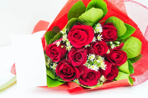 Red bouquet with card — Stock Photo, Image