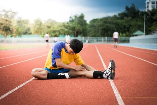 Asijské atlet na trati — Stock fotografie