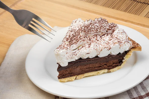 Chocolate Tart with cream and cocoa powder on the top — Stock Photo, Image