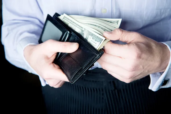 Money in the hands of men. purse — Stock Photo, Image