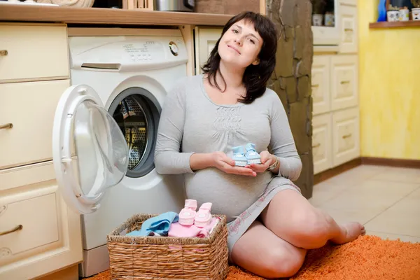 Women wash clothes newborn — Stock Photo, Image