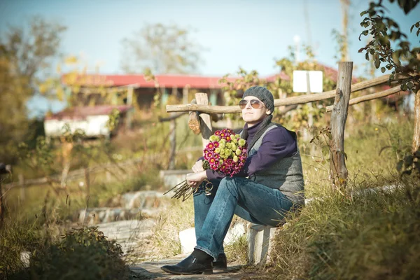 Man with flowers — Stock Photo, Image