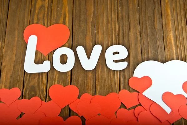 Tarjeta festiva con la palabra amor y corazón — Foto de Stock