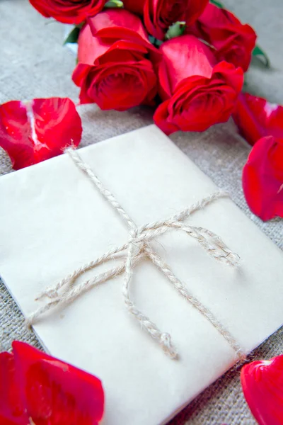 Letter and rose petals — Stock Photo, Image