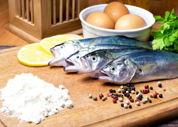 Fresh fish on the table — Stock Photo, Image