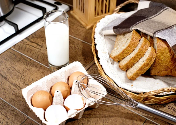 Glass of milk, bread and eggs — Stock fotografie