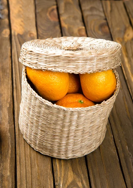 Fresh tangerines on a wooden table — Stock Photo, Image