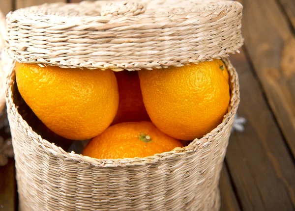 Fresh tangerines on a wooden table — Stock Photo, Image