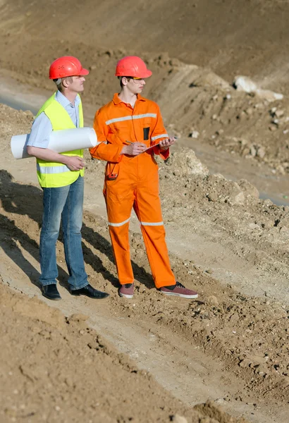 Two road service engineer. Royalty Free Stock Photos