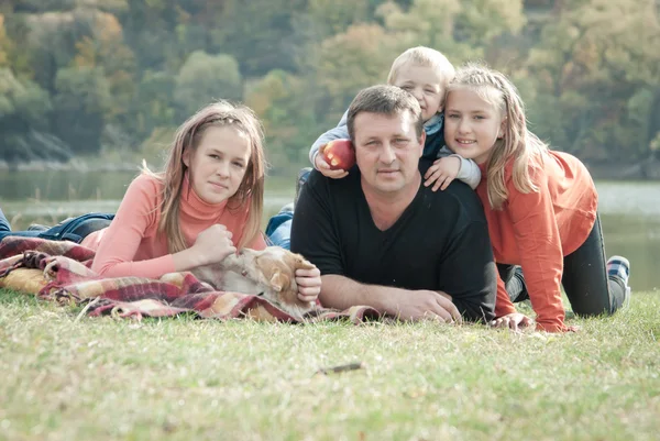 Happy large family with children in autumn park — Stock Photo, Image