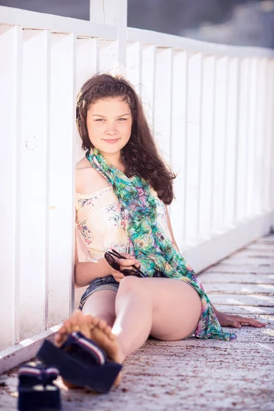 Portrait of young happy beautiful girl outdoors in sunny summer day — Stock Photo, Image