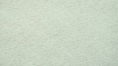 Saf bej ağ benzeri tül. Ağlı kumaş. Yakın plan. Şampanya ya da süt rengi peçe ya da muslin. Farklı boyutlarda delikleri olan bir perdenin yakın çekimi. Soyut arkaplan